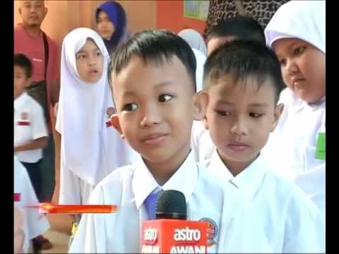 Pelbagai ragam murid pada hari pertama persekolahan