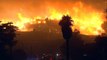 Thousands evacuated as southern California fires spread