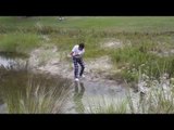 Andy plays from edge of water at Old Corkscrew in Florida