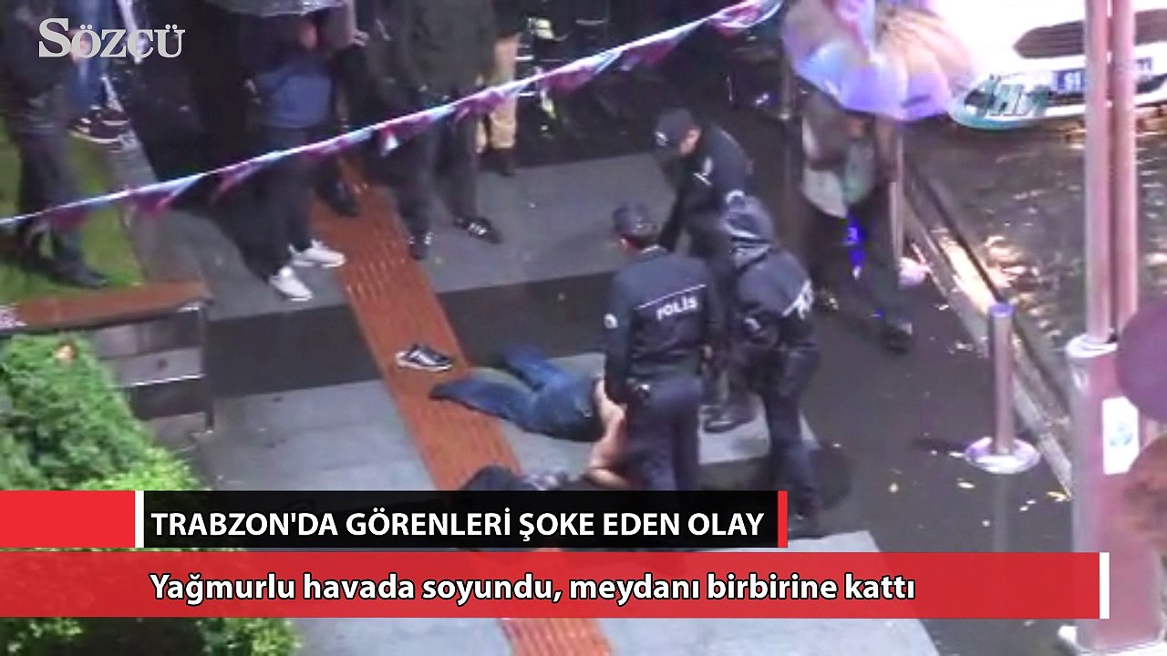 Yağmurlu havada soyundu, meydanı birbirine kattı