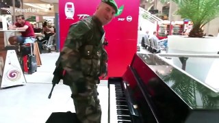 French soldier sings and plays piano at Paris train station