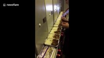 Flight attendant suspended for eating leftover meal on plane
