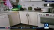 Raccoon finds cupboards bare in Kazakh kitchen!