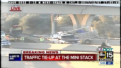 Landscaping trailer hanging off Loop 202