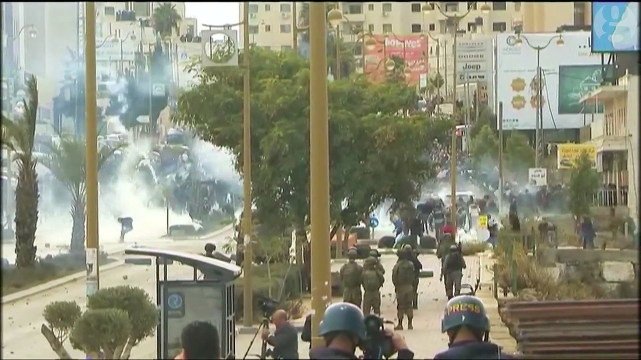 Israeli troops clash with Palestinian protesters in West Bank over Jerusalem decision