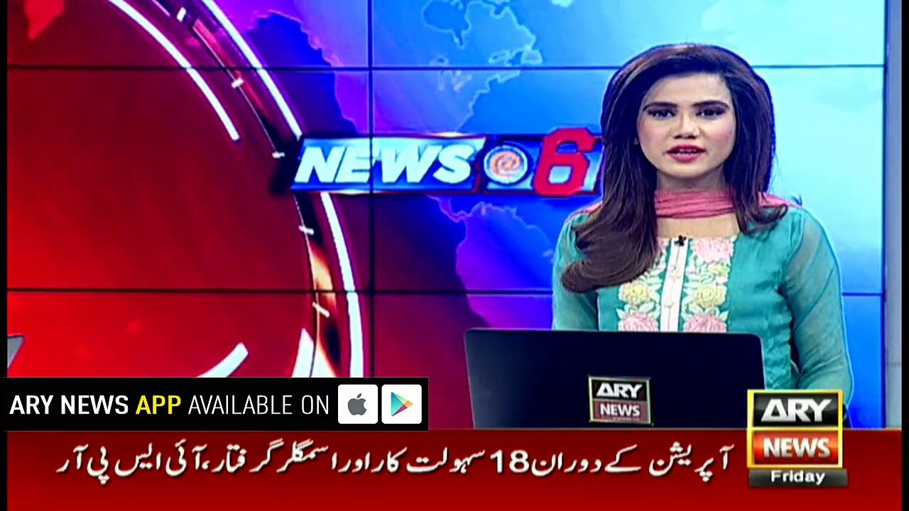 Woman on her cell phone walks into a car elevator garage