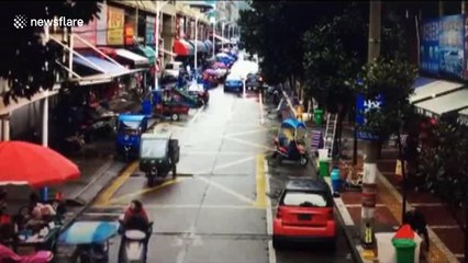 Car ends up on side in bizarre slow-speed crash