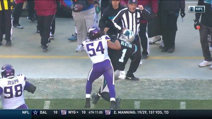 Newton gets lightly hit by Kendricks and falls to the ground