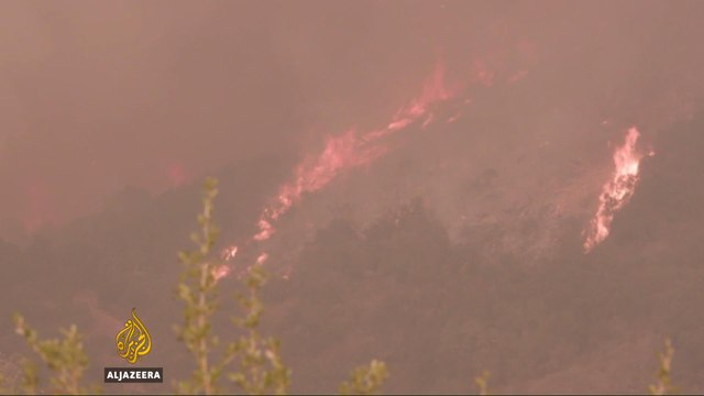 Santa Barbara threatened as California fires rages on