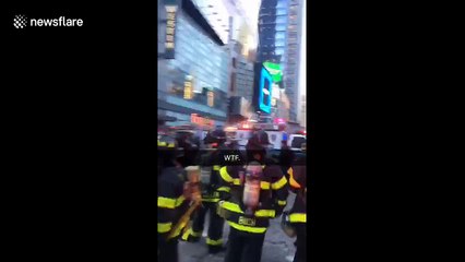 Firefighters line street after New York subway explosion