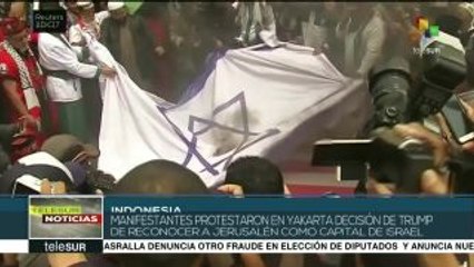 Miles de indonesios queman banderas de EE.UU en protesta contra Trump