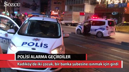 Tải video: Isınmak için bankaya girince polisi alarma geçirdi