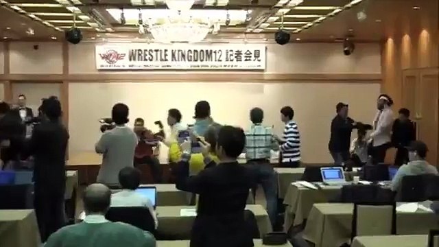 Kenny Omega Attacks Chris Jericho at Wrestle Kingdom 12 Press Conference