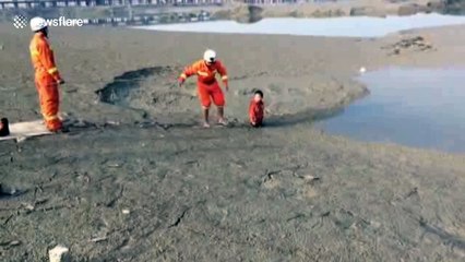 Firemen frees boy stuck in wetland