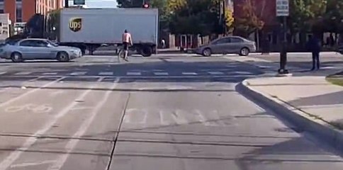 Cyclist is tossed high into the air by car in Chicago