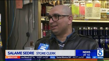 Video Shows Man Throwing Beer Cans at Liquor Store Clerk During Attempted Robbery