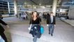 Queen Rania Of Jordan Hops Into A Matte Black Tesla Upon Arrival In Los Angeles