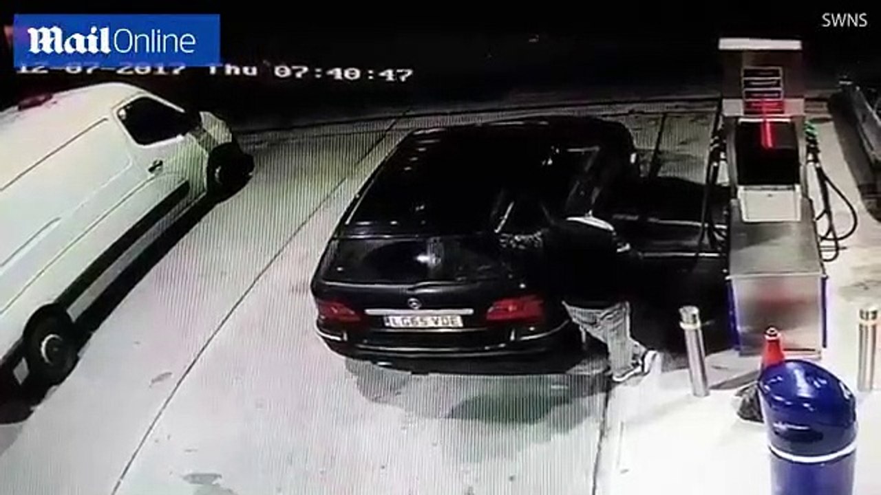 Car on fire at gas station