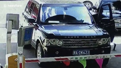 Car driver smashes access control barrier in residential area