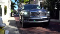 2018 INFINITI QX80 in Graphite Shadow Driving in the City