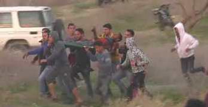 Protesters Carry Away Man After Reports of Deaths and Injuries in Gaza Protest