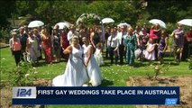 i24NEWS DESK | First gay weddings take place in Australia | Saturday, December 16th 2017