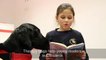 Dogs help children read in Lithuania library
