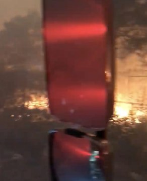 Driver's View as Firefighters Push Into Montecito Near Santa Barbara