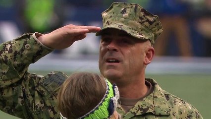 Armed Service member is reunited with family during Seahawks game