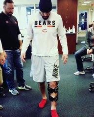 the Bears TE shared a 17-second video of himself walking without any crutches while wearing a bulky brace