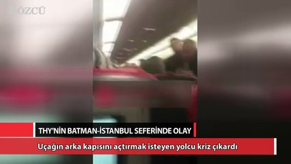 Uçağın arka kapısını hava almak için açtırmak isteyen yolcu kriz çıkardı