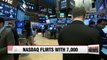 NASDAQ flirts with 7,000 mark for first time during trading