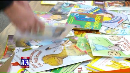 Salt Lake City Police Officers Donate 1,200 Books to Students