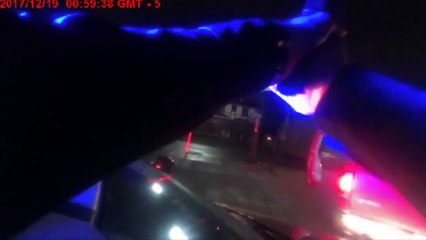 Body Cam Footage Shows Man Putting Officer in Chokehold, Dragging Him in Truck