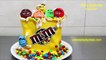 M&M's Funny Birthday Cake - How To Make by CakesStepbyStep-meu1M6tnsvE