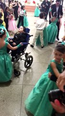 Sweet Sister Includes Little Brother in Graduation Ceremony