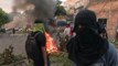 Opositores y policía de Honduras se enfrentan con gas y piedras