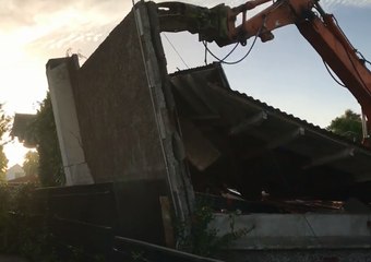 Excavator Pushes Wall Into Neighbour's Home During Auckland Home Demolition