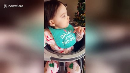 Baby and dog enjoy howling together