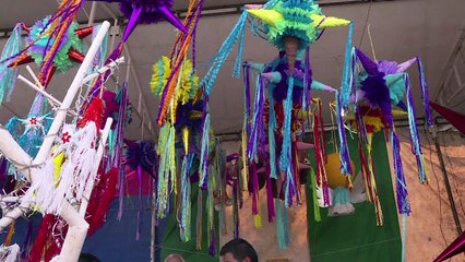 Mexico smashes piñatas to ward off evil at Christmas