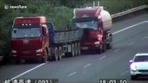 Transport lorry rear-ends broken down lorry on motorway