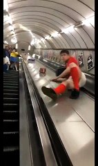 Funny Video: Escalator Slide Goes Very Wrong