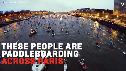 Hundreds Take Part In Stand Up Paddleboard Race On Paris Seine