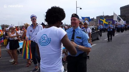 Swedish policeman dancing at gay pride