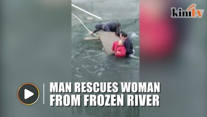 Man braves freezing river to rescue 70-year-old woman