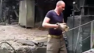 Man puts his hand in molten metal  Find, Make & Share Gfycat GIFs