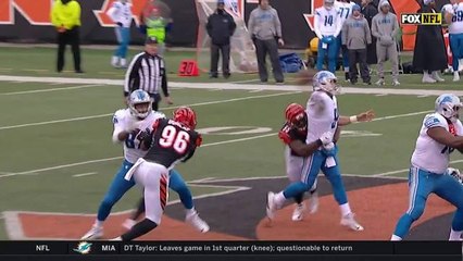 Stafford gets hit as he throws and goes right to Vincent Rey for the interception