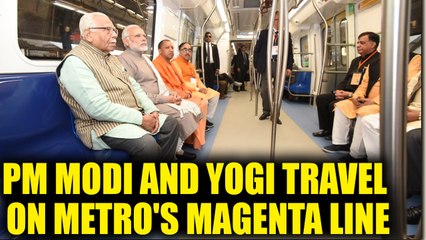 下载视频: PM Modi and UP CM Yogi Adityanath travel on DMRC's Magenta line, Watch | Oneindia News