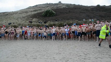 Christmas Swim at Sennen Cove in Cornwall