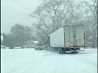 Pick-Up Truck Tows Tractor-Trailer in Ohio Lake-Effect Snow